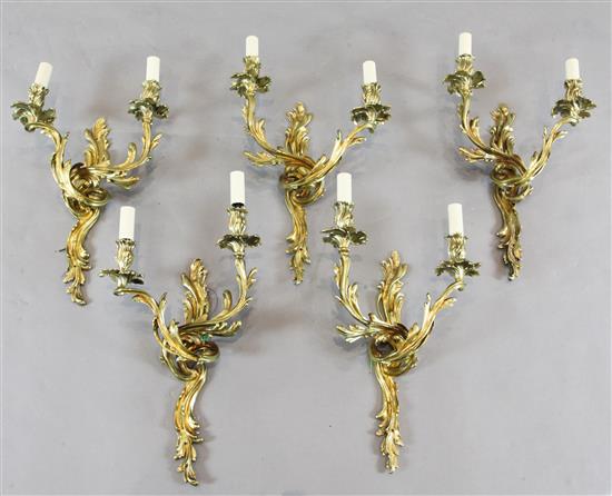 A set of five ormolu twin branch wall appliques, height 19.75in.